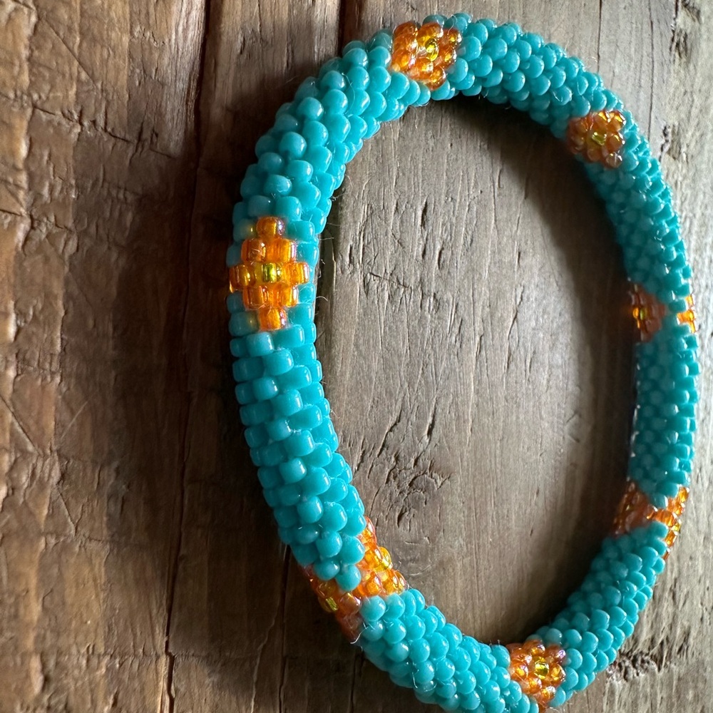 Elegant Turquoise and Orange Beaded Bracelet